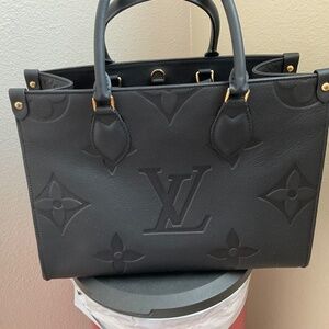 Louis Vuitton black monogram ON-THE-GO GM perfect condition